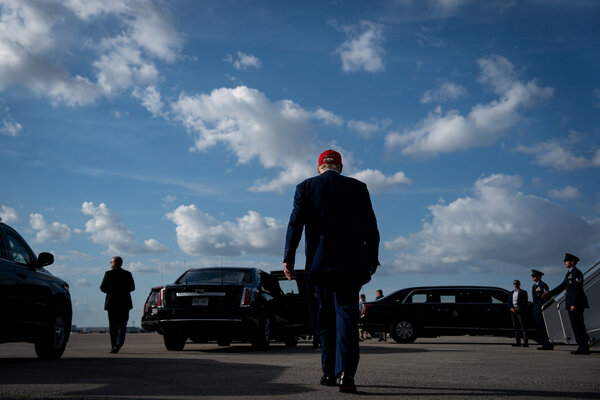 Trump rally Michigan crowd and stage during spring 2025 rally