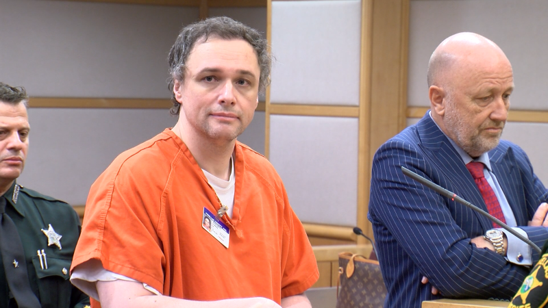 Courtroom scene with attorneys and judge - a criminal defense attorney advocates for the accused
