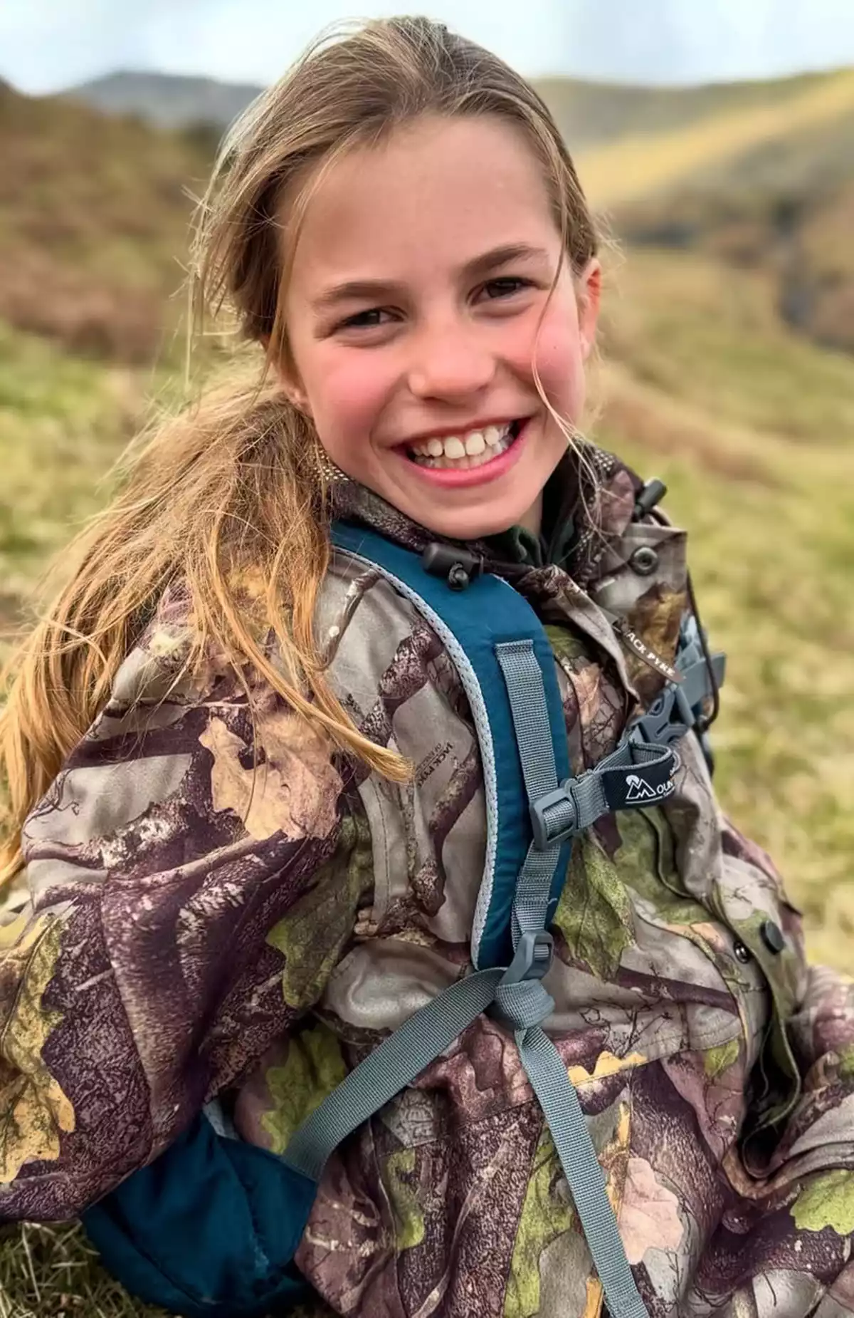 Princess Charlotte smiles on her 10th birthday, captured outdoors by Kate Middleton