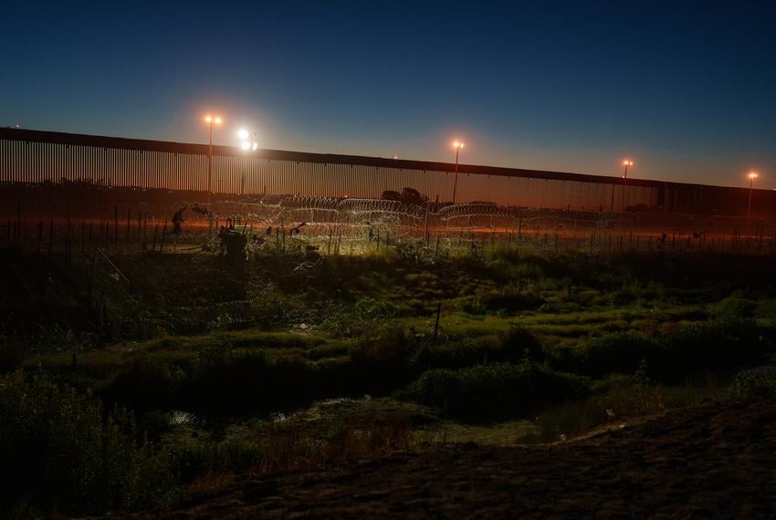 Border checkpoint with military presence along the New Mexico border, illustrating the recent new mexico military border charges.