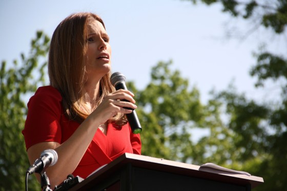 Allison Riggs at a rally in Raleigh, advocating for justice and fair elections in North Carolina. 
