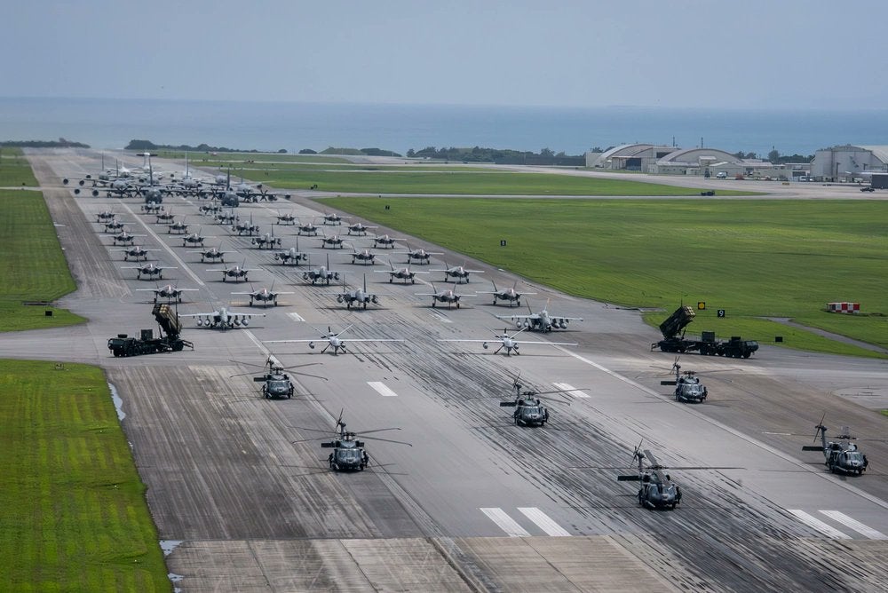 US military aircraft lined up at Kadena Air Base during an elephant walk