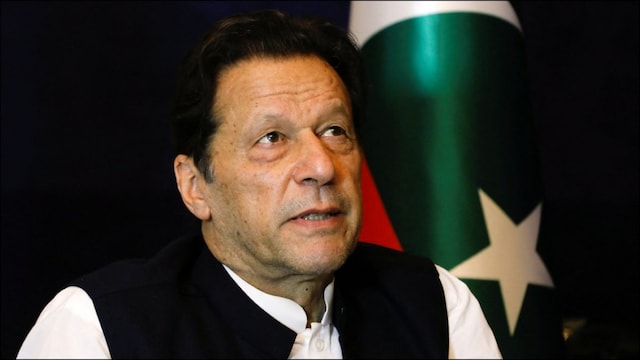 Imran Khan in discussion during a political rally