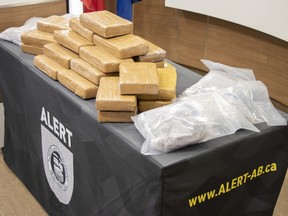 Police officers during a drug seizure in Edmonton