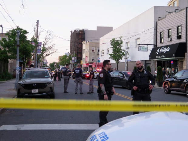 NYPD vehicles and officers responding to an incident in Staten Island