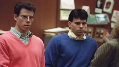 Courtroom photo of the Menendez brothers awaiting resentencing hearing