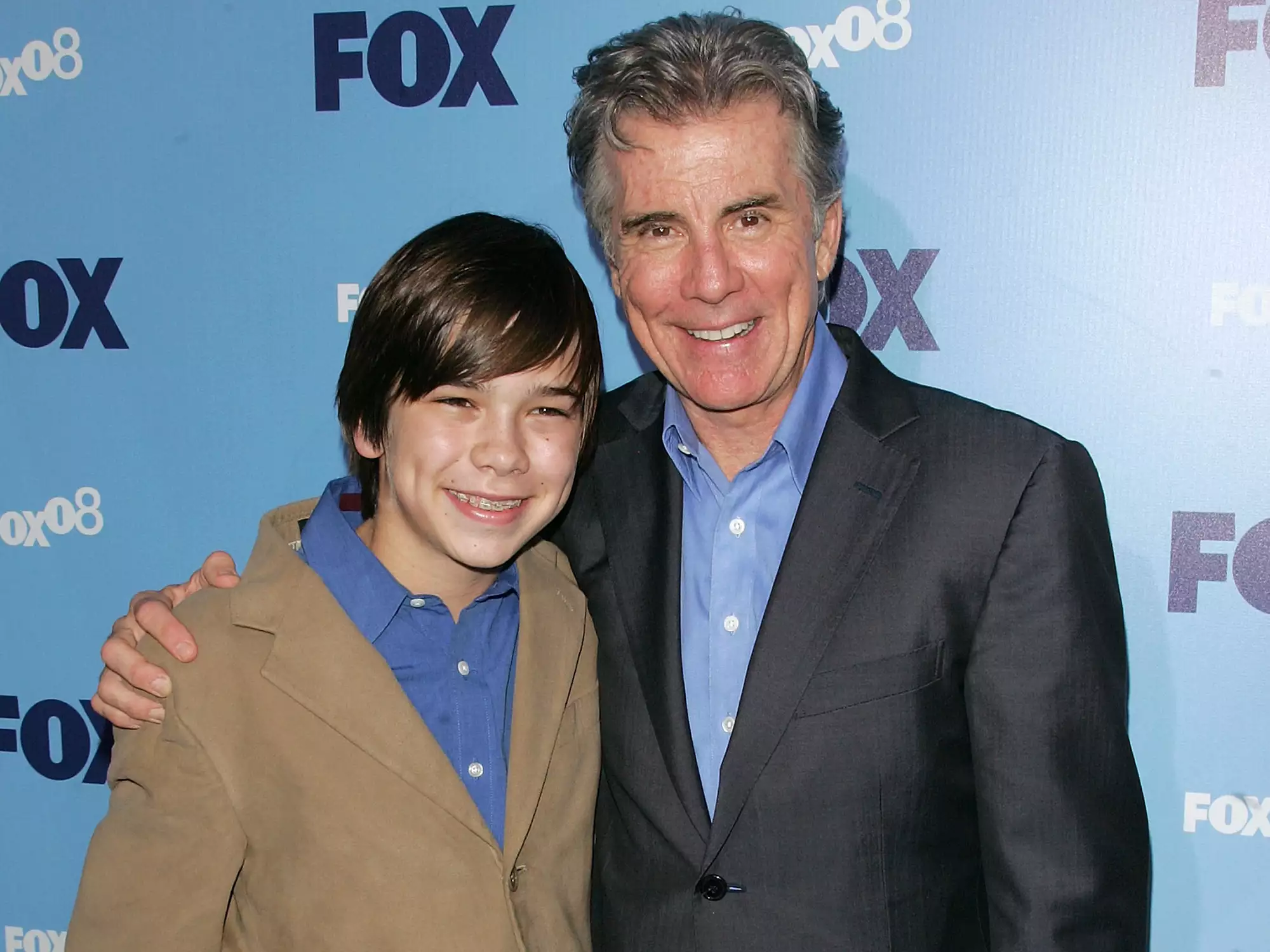 Callahan Walsh and John Walsh backstage at a TV event