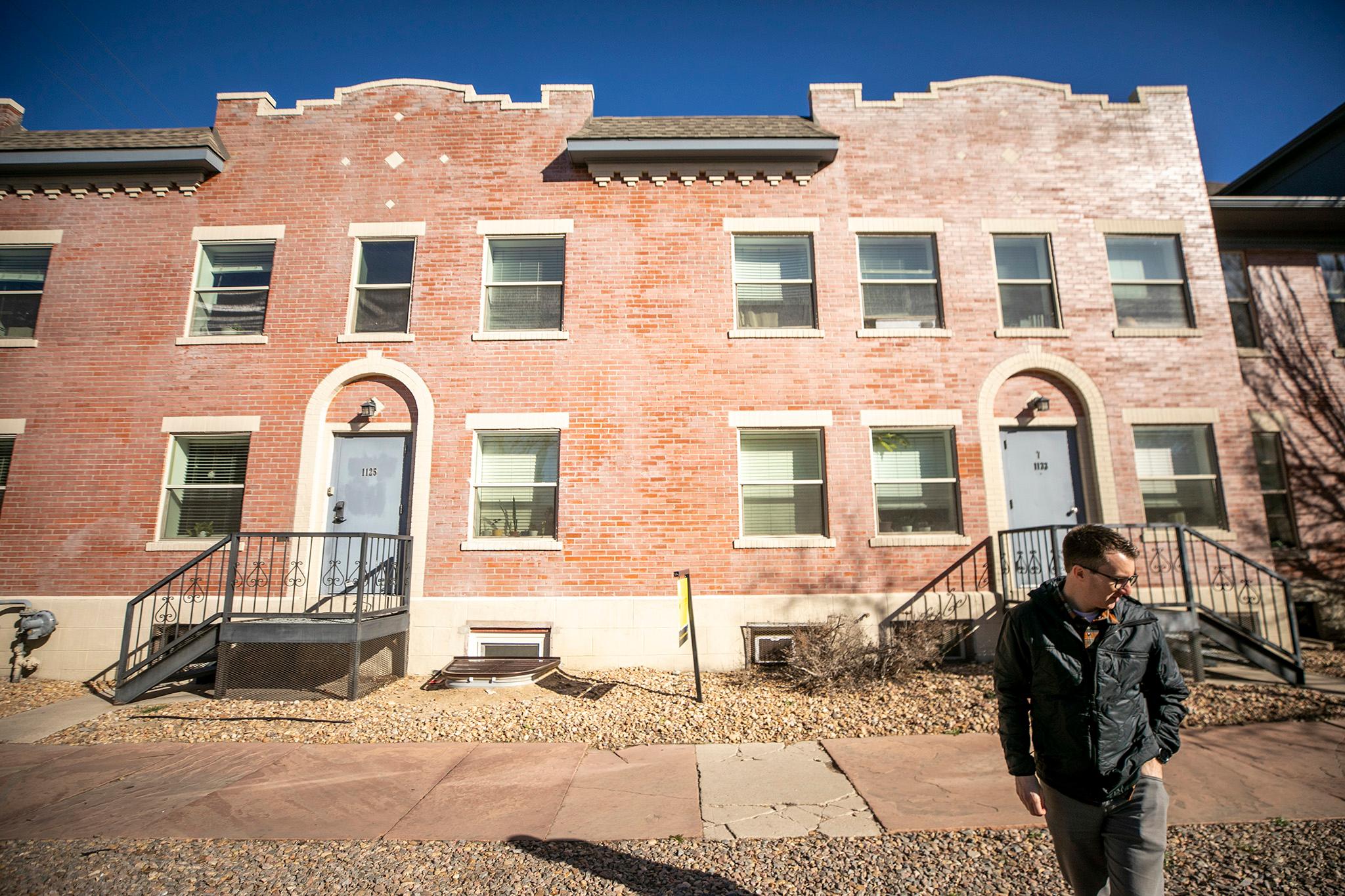 Modern single-stair apartment building in Denver’s urban landscape