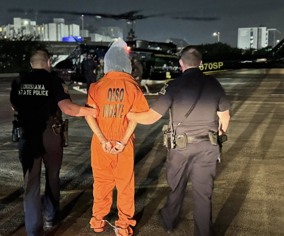 Law enforcement transporting recaptured escapees by helicopter after the inmates escape New Orleans jail