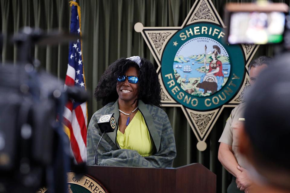 Tiffany Slaton at Fresno press conference after her rescue, showing resilience in the Sierra Nevada mountains.
