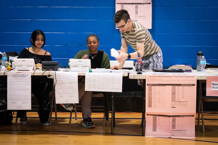 Election volunteers at a polling station on election day 2025 in Philadelphia.
