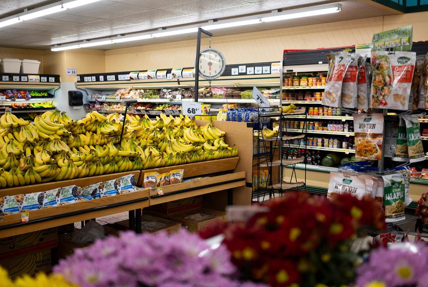 Shoppers using SNAP benefits at a grocery store